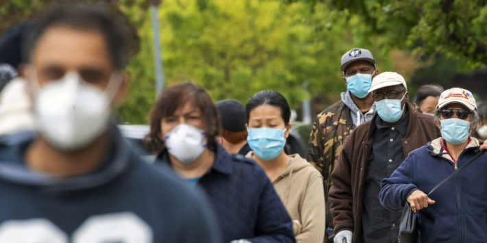 A masked crowd amidst the covid-19 outbreak