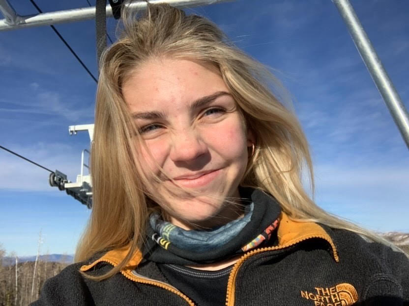 Ellie Reese on a ski lift