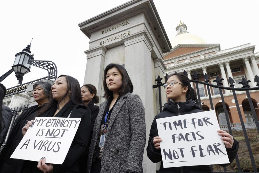 Asian Americans protesting for protections for the community.