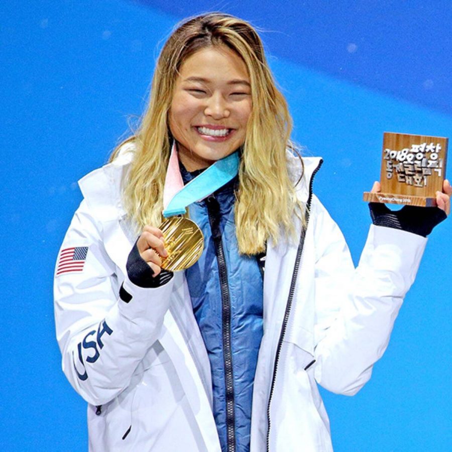 Chloe Kim and her Olympic gold medal. 