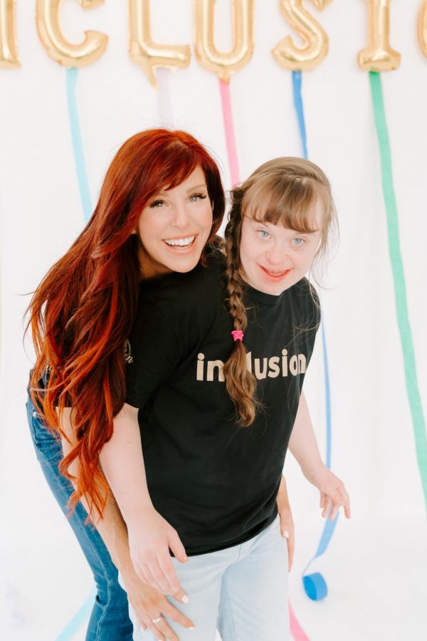 Taylor, founder and CEO of The Garden Foundation and Tribe Inclusive Learning Platform, and her sister.