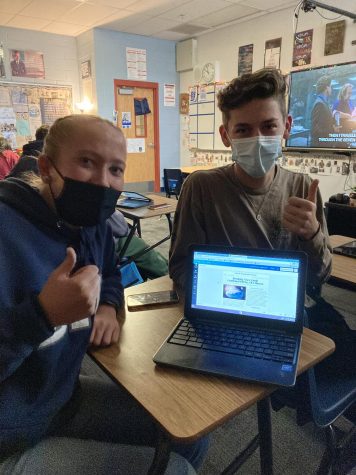 Hailey Morrow and Justin Lewis work together on their fake news assignment (Photo By: Kale Nelson)