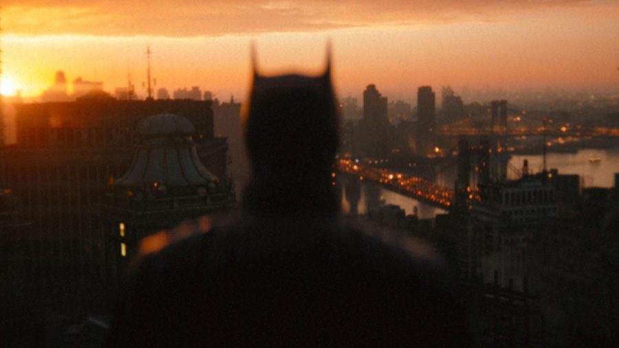 Batman looking out onto Gotham City.