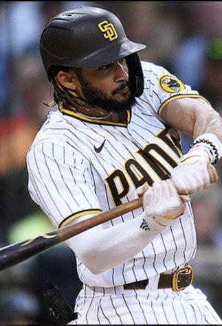 Tatis hitting ball