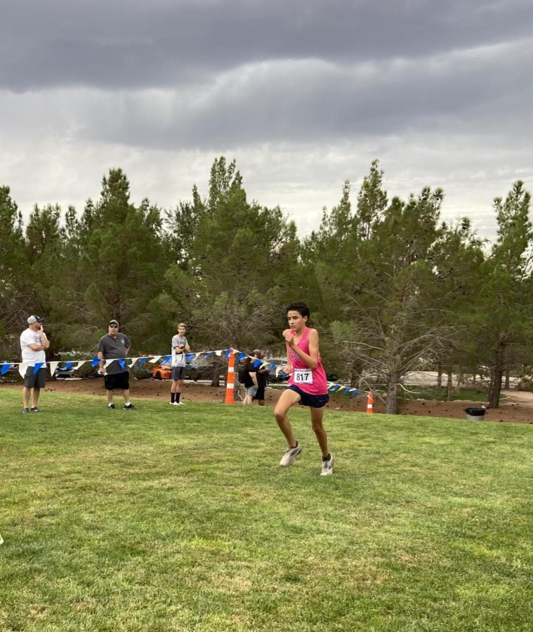 Sophomore Landon Larson competing in a cross country race.