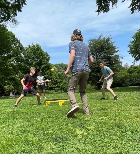 Porter Brough and his friends playing Spikeball.