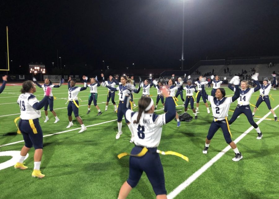 Varsity Flag Football doing Mustang Jacks after defeating Liberty High School
