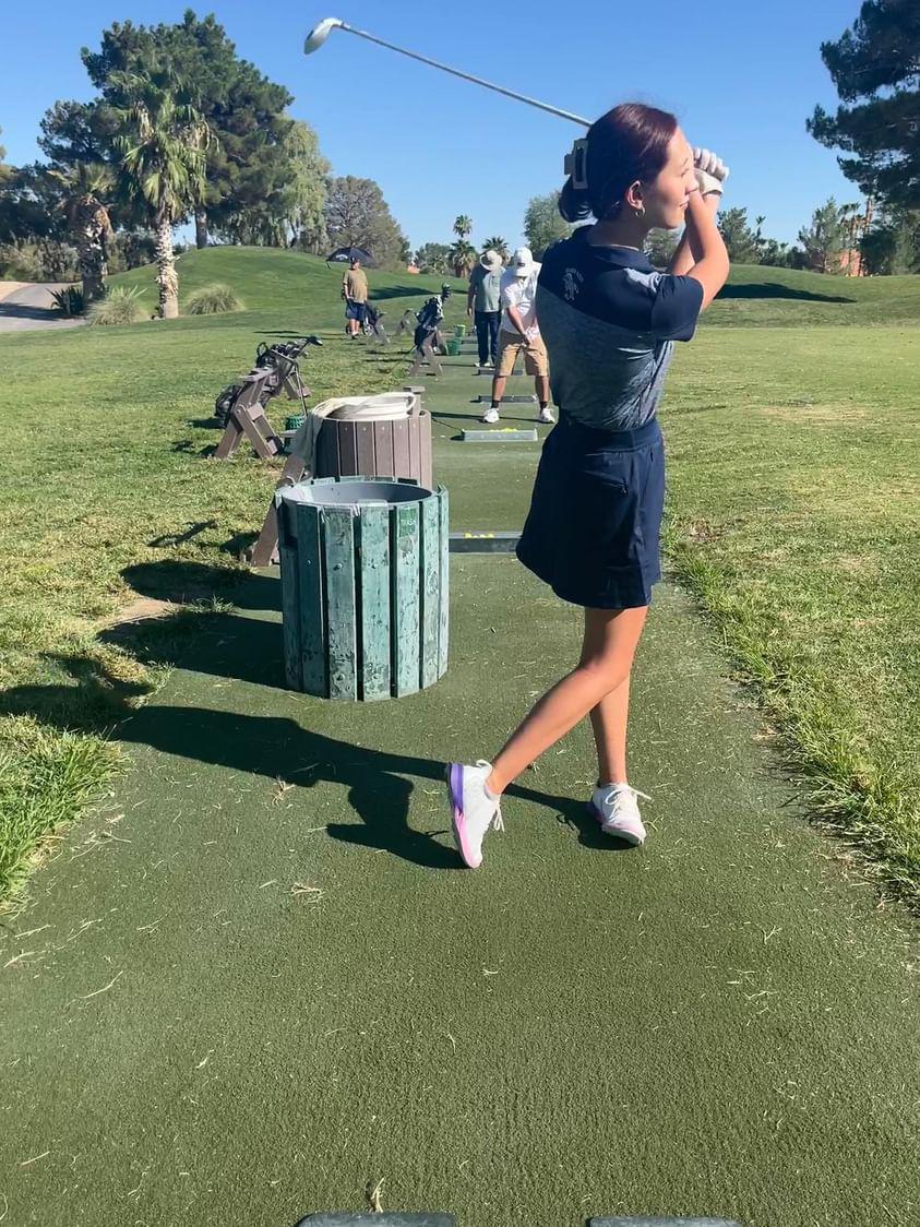 Senior, Macaylee Van De Wege at the driving range