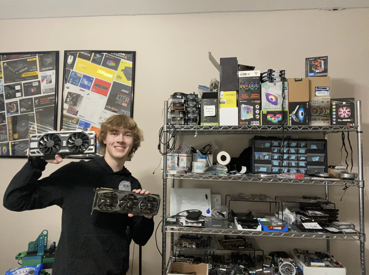 Tyler Schauerhamer showing off his computer parts. 