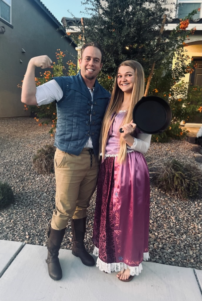 Coach Mike and Mrs. Smith showing off their cute costumes