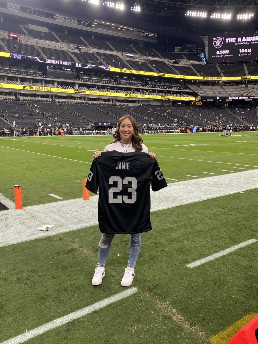 Aaliyah with her personalized jersey courtesy of The Las Vegas Raiders.