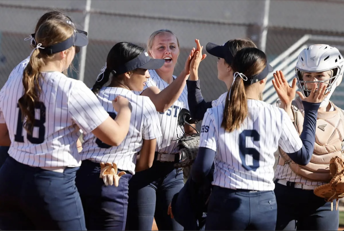 Shadow Ridge softball players pumping each other up 