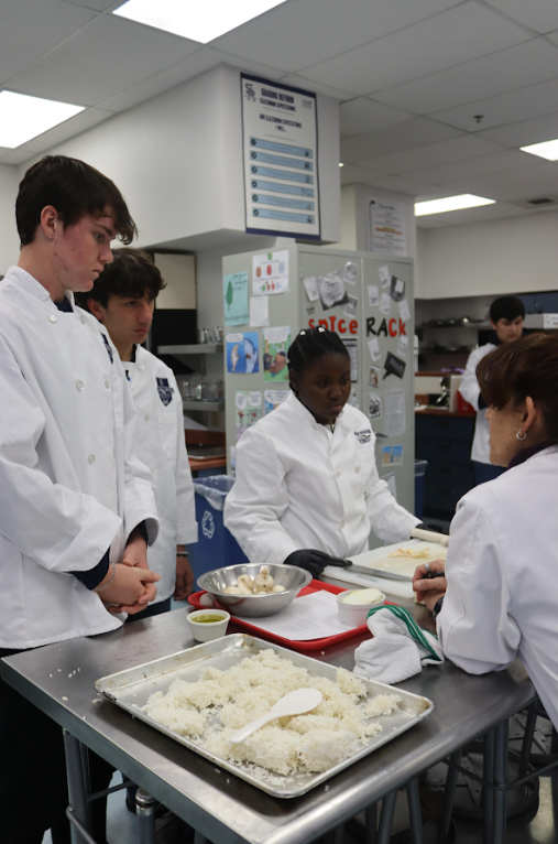 Chef Martinez talking to her students