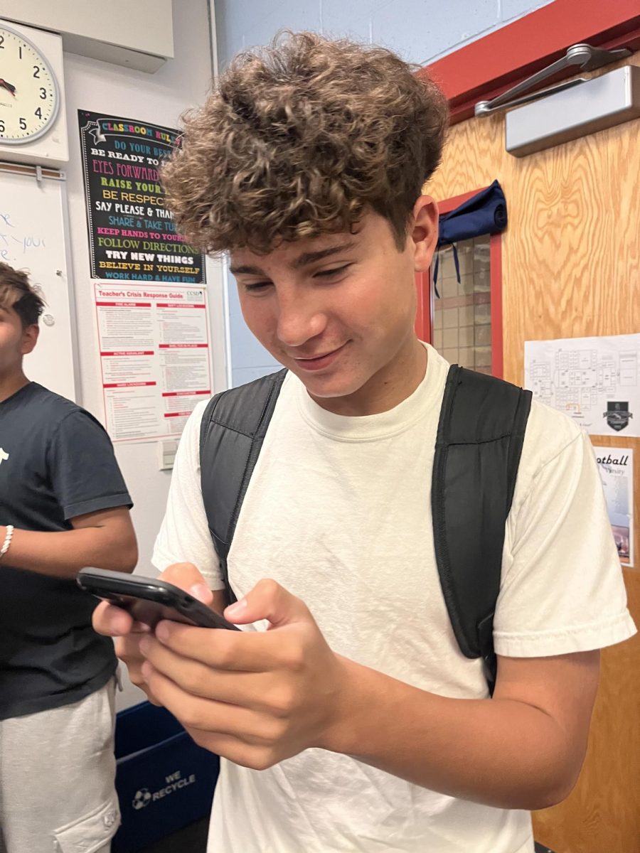 A student watching a video on TikTok