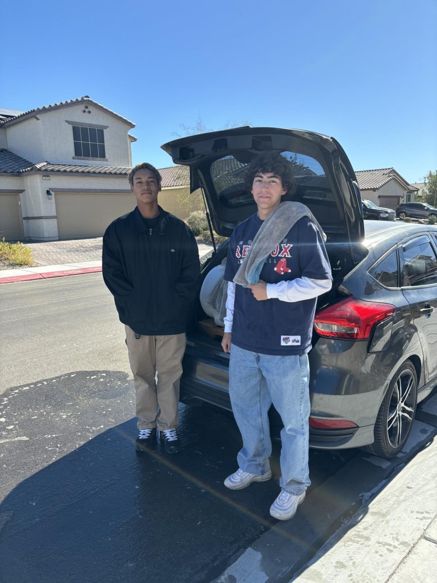 Markus Leonguerrero and Sam Stahl detailing a client's car