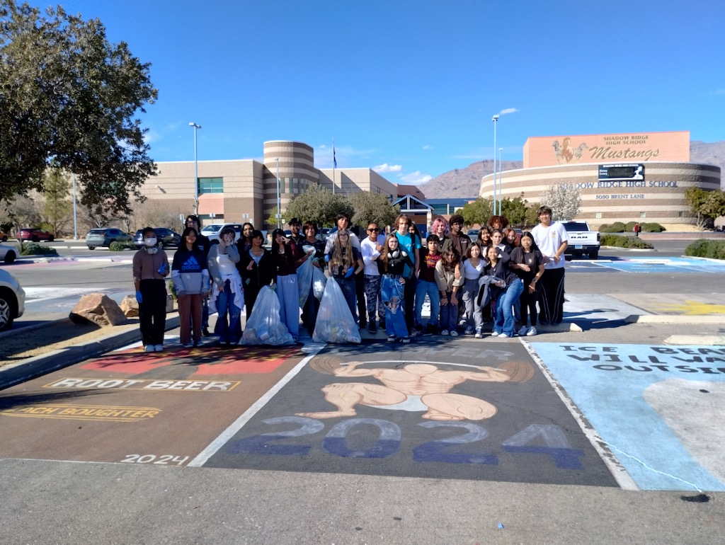 Key Club at their parking lot clean up with garden club