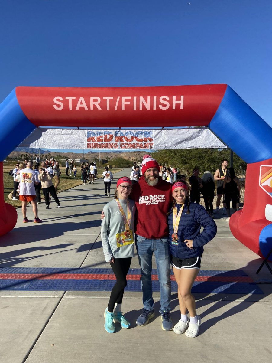 Maya and Ruby joined by Coach Jimenez at the finish line