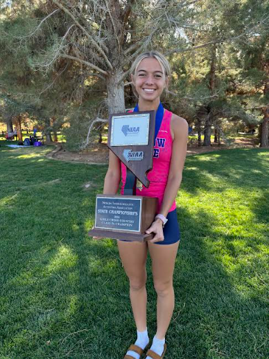 Stosich with the team trophy after winning state