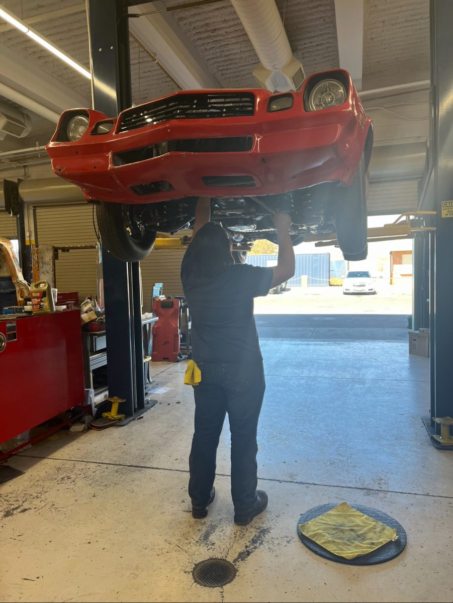 Aiden working on a car