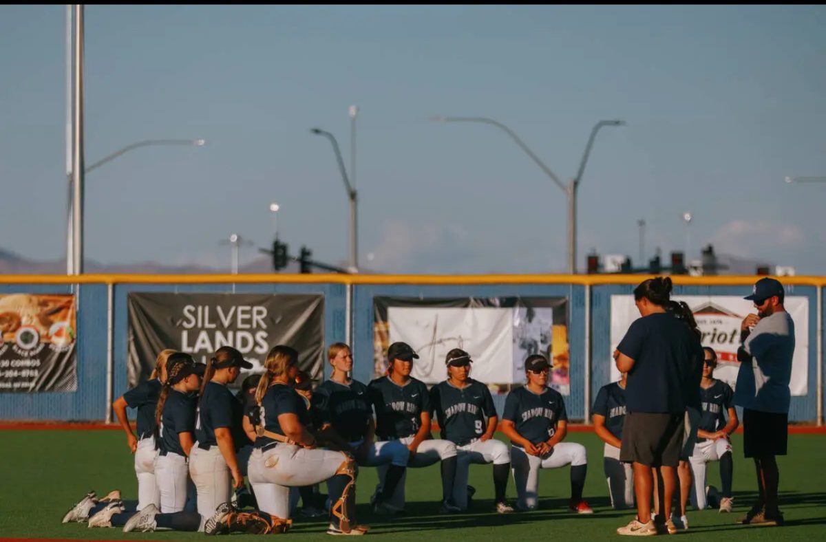 Shadow Ridges Softball Team talking after a hard loss