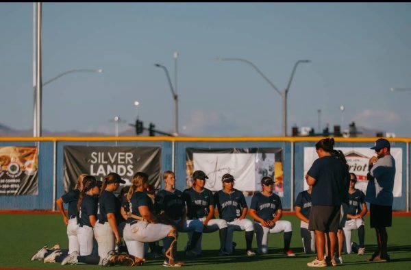 Shadow Ridges Softball Team talking after a hard loss