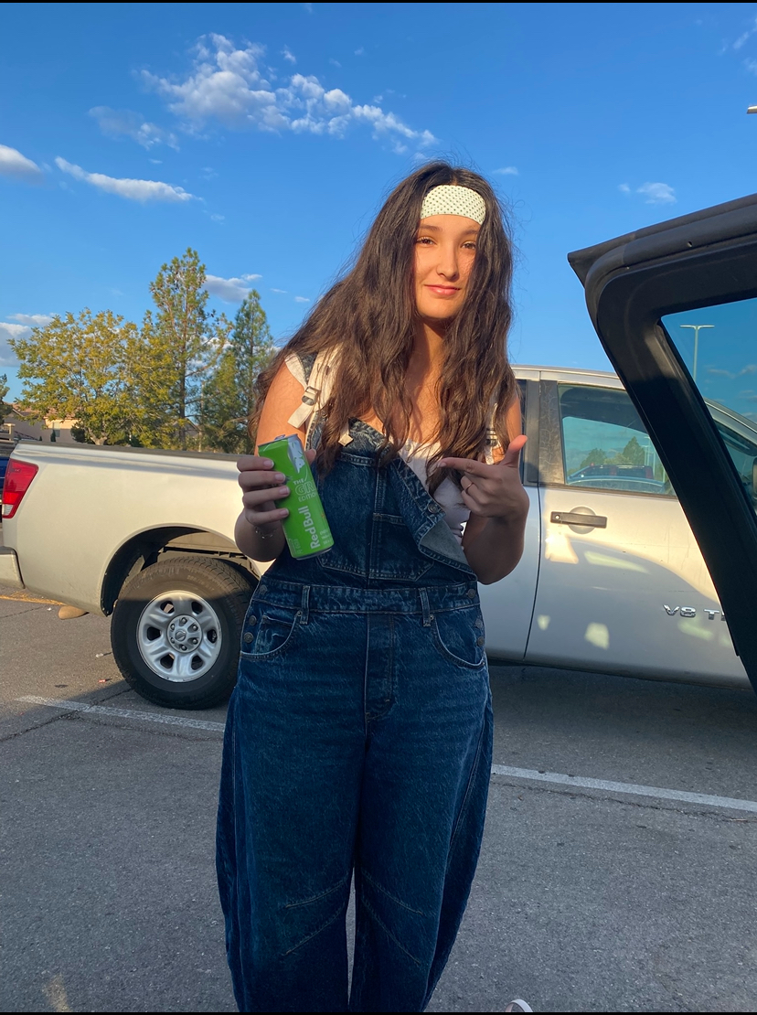 Piper Stewart holding a red bull.