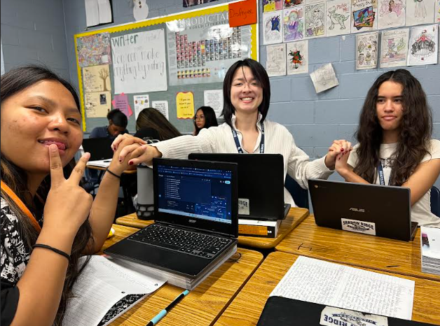 Three girls in 10th grade English being friends. 