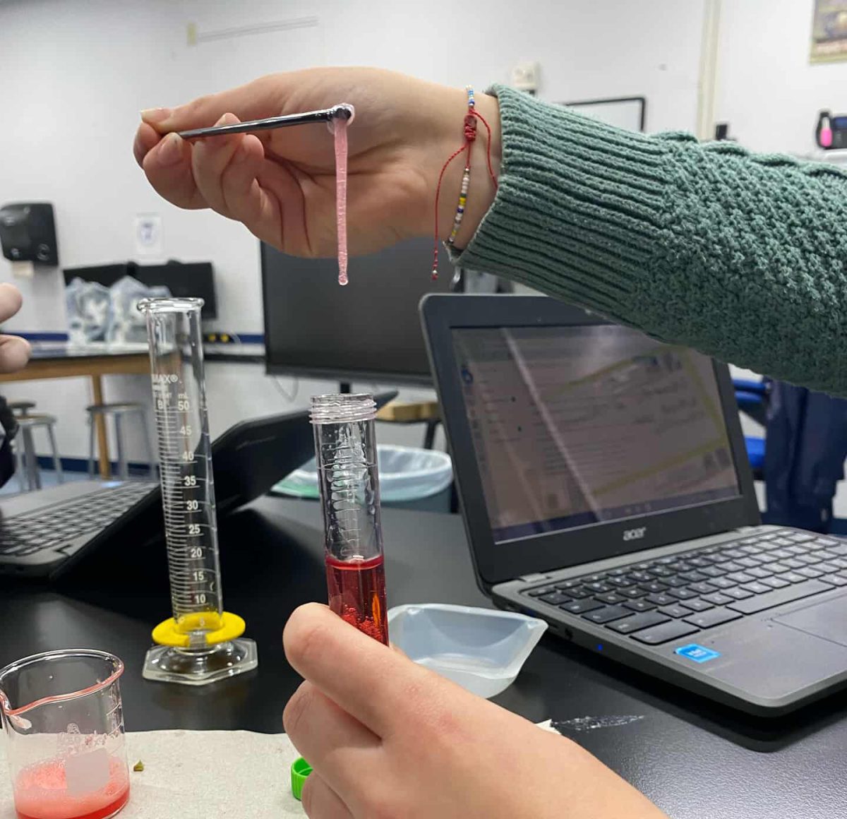 Forensic science student doing a DNA extraction from a stawberry.