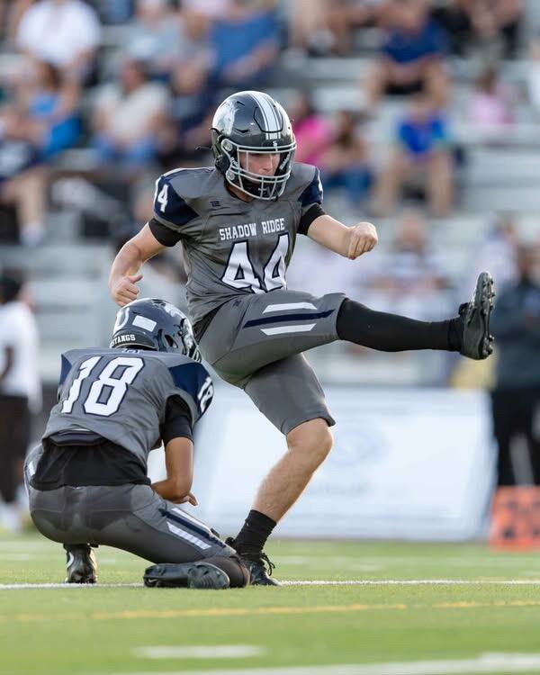 Kicker Bryan Brimhall Scoring an extra point.