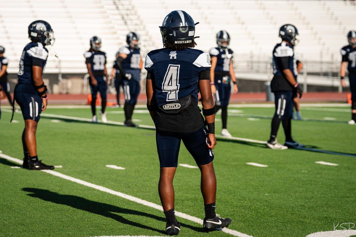 Xavion Cros getting ready to start the football game.