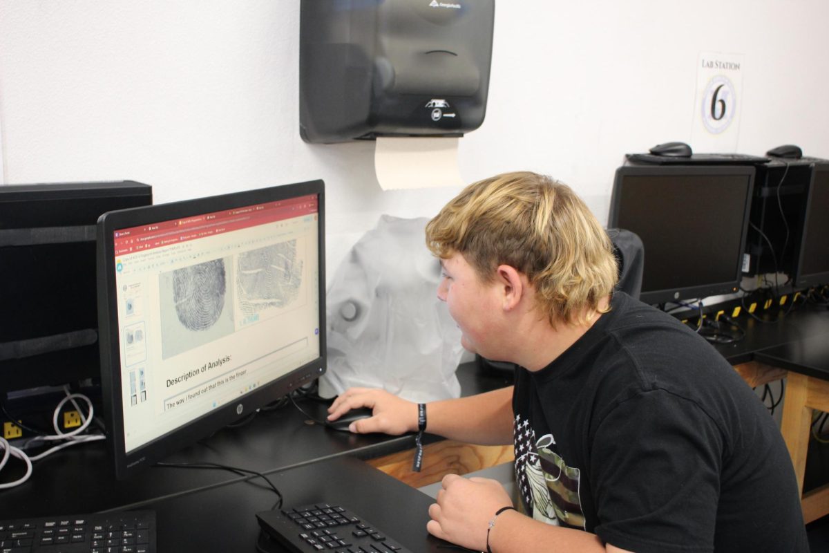 Soren Oren looking at the finger print analysis. 