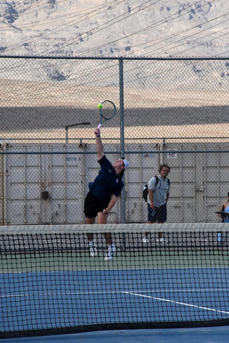 Blake Ballantyne serving the ball during one of his matches.