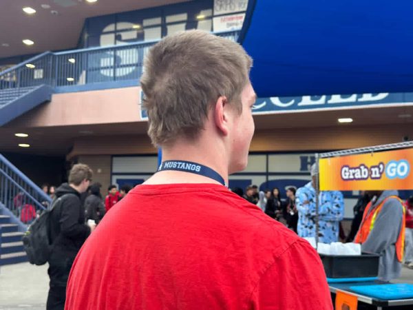 A student looking longingly at the breakfast cart.