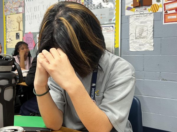 Student being stressed over class work. 