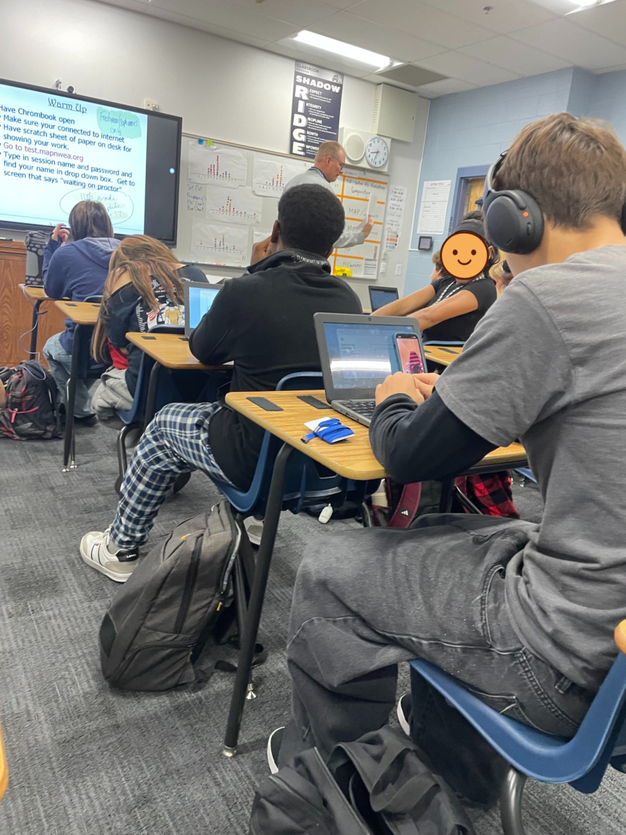 Student secretly on his phone