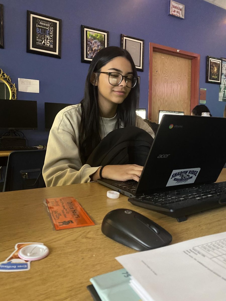 Sophia working on her journalism article during 7th period!