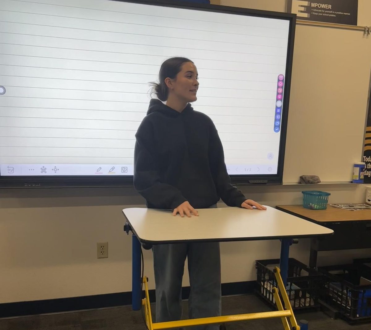 Lauren Luth speaking in Speech and Debate Club.