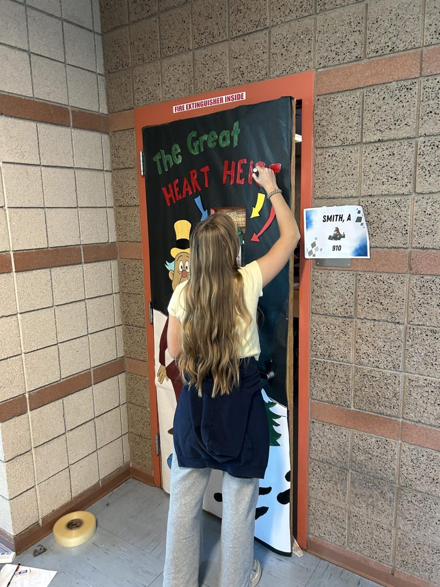 Allison Reynolds painting the door.
