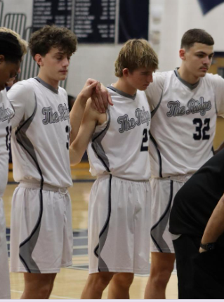 Troy during a huddle