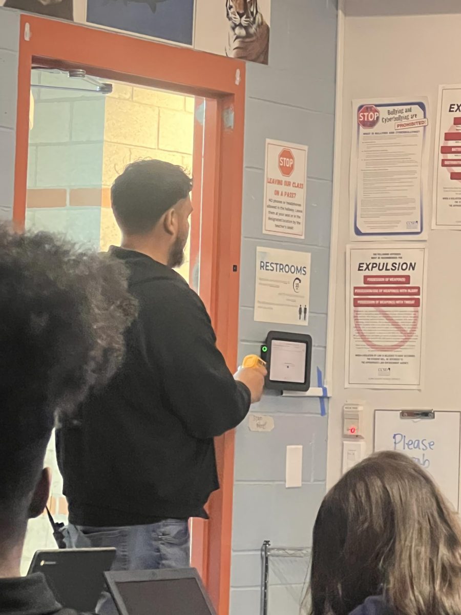 Checking the temperatures in a hot room