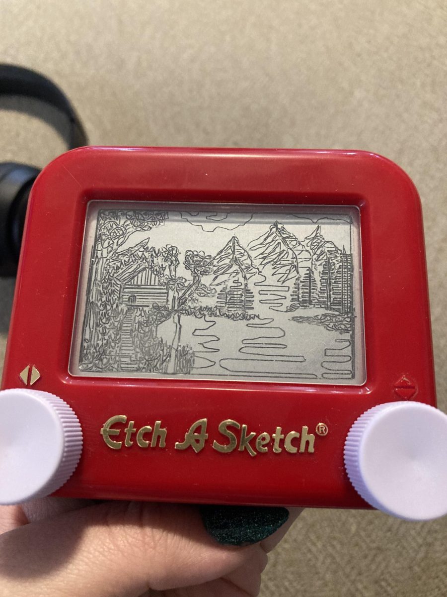 Cook's first attempt at using an Etch A Sketch 