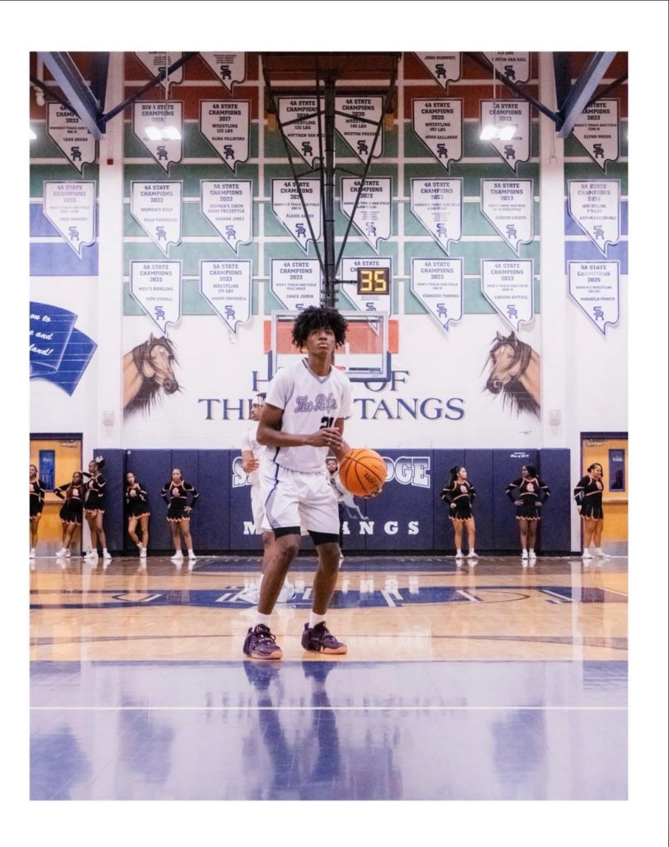 Jaden about to take  shot for the Shadow Ridge Basketball Team.