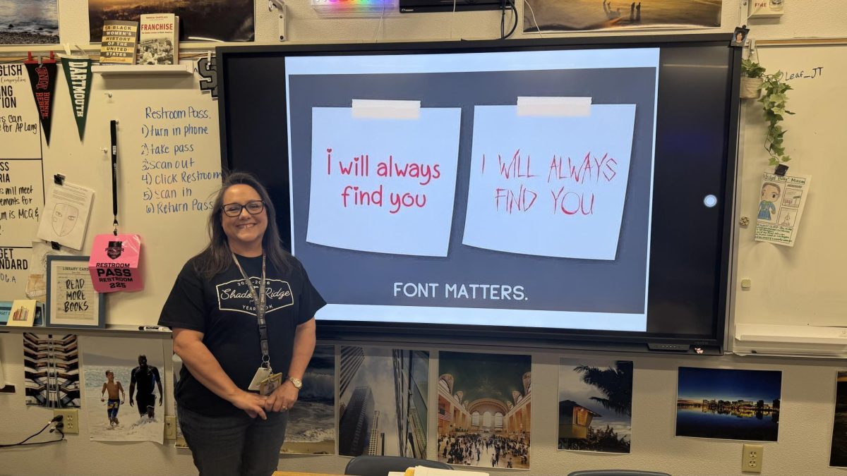 Mrs. Mason smiling with a font