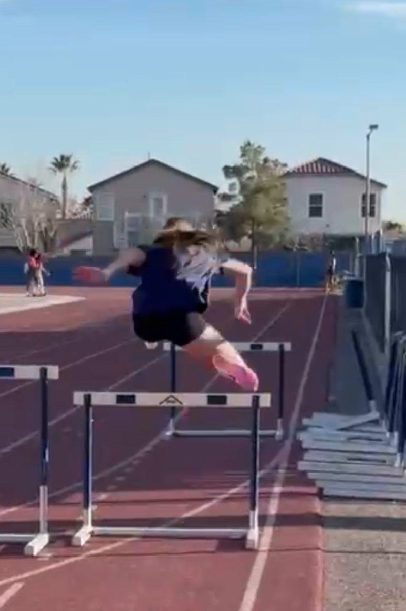Audrey Luth running hurdles at practice