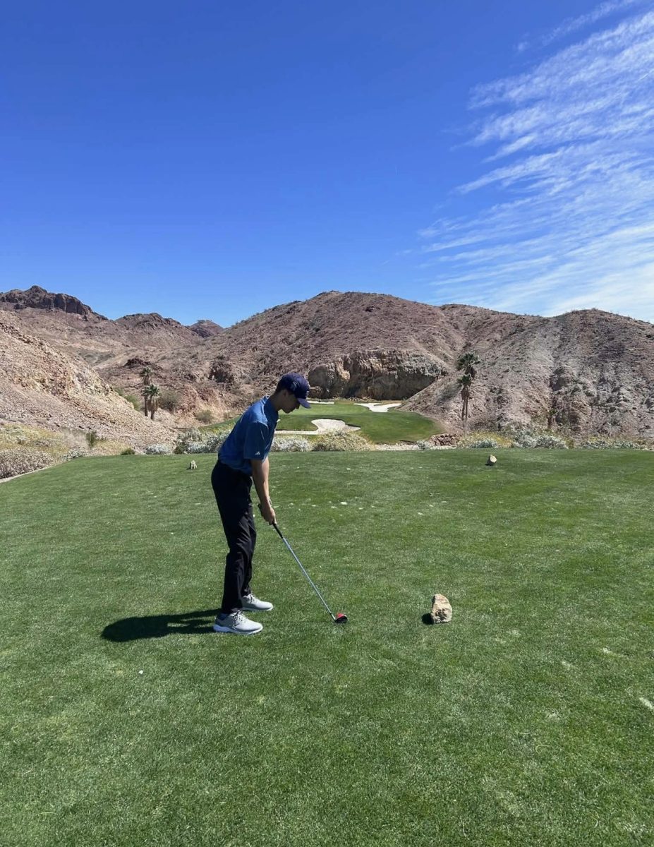 Freshman Timothy Creedon III Playing Golf