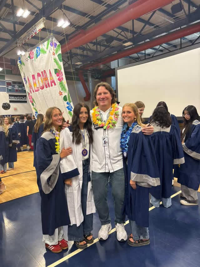 Nighswonger with seniors at Grad Walk (Rachel Roter)